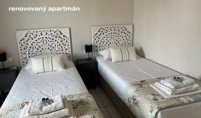 Niki-Apartments--přidat-popis-ronovovaný-(5).png