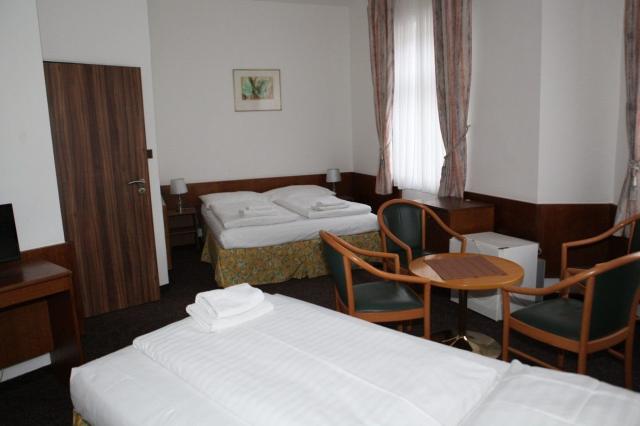 Třílůžkový pokoj