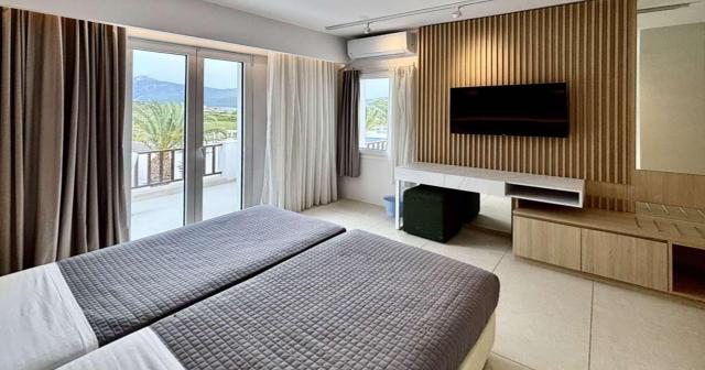 Sirenes-Beach-Resort-FAMILY-ROOM-2025-02