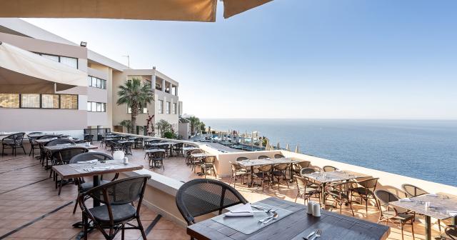 Athina-Palace-Resort-and-Spa-MAIN-RESTAURANT-TERRACE