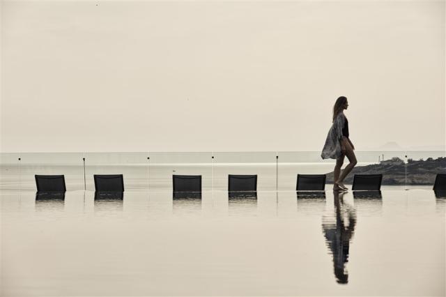 10.minos palace pool woman walking.jpg