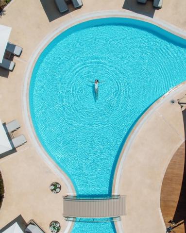 Sani Dunes - Girl Swimming in the Pool_475x594.jpg