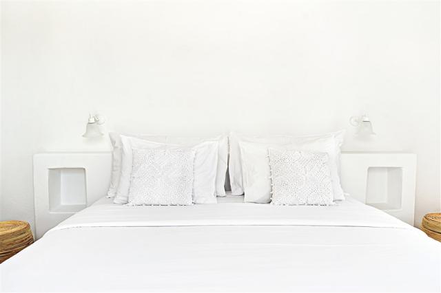 34-Classic-room-sea-view-bedroom-area-with-whitewashed-interior