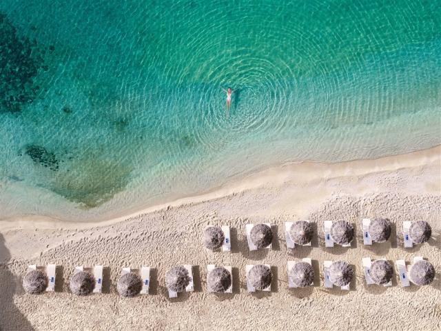 01-Mykonos-Blu,-World-Famous-Psarou-Beach_72dpi.jpg