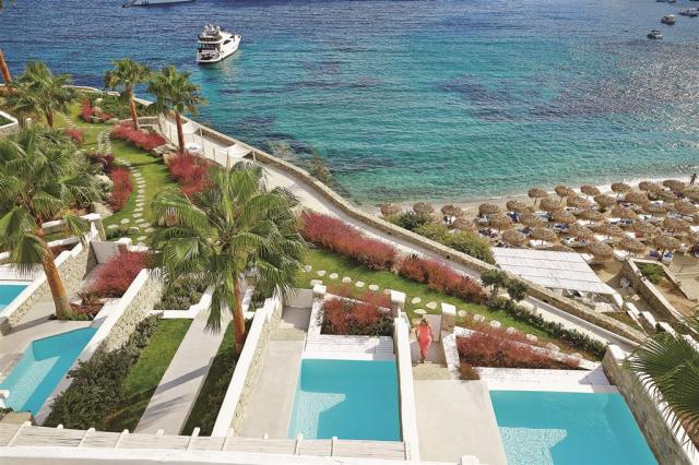 Right-on-the-famous-Psarou-Beach-a-stunning-resort-with-dramati
