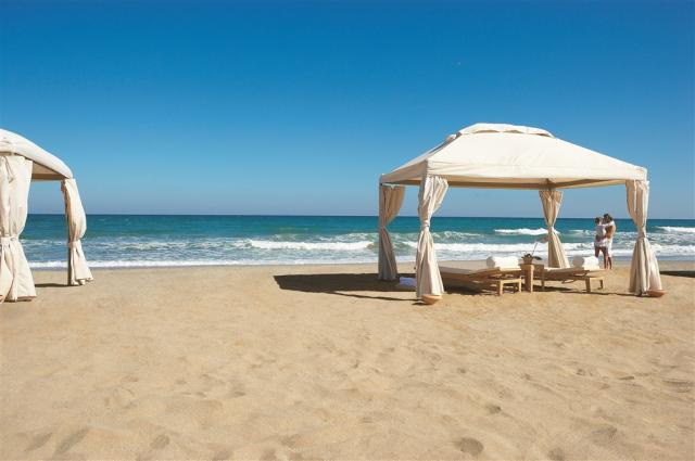 16-A-stretch-of-coast-that-gently-curls-into-two-coves-of-fine-
