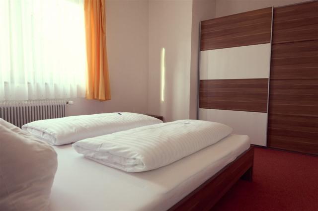 PARKHOTEL KIRCHBERG - pokoj s lůžky