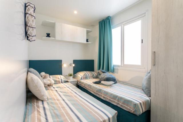 Mobilhome Deluxe se 3 oddělenými ložnicemi až pro 6 osob