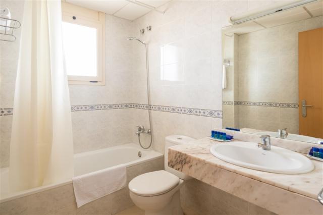 bathroom-and-bathtub_-royal_sun_suites_52630574381_o.jpg