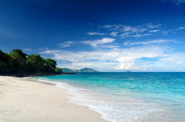 Tropical beach. Padangbai, Bali, Indonesia._shutterstock_125334