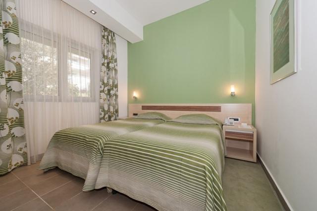dvoulůžková ložnice a denní místnost - typ APT. 2+2 B-ST