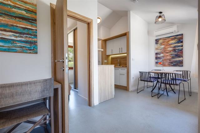 dvoulůžková ložnice a denní místnost - typ APT. B2+2