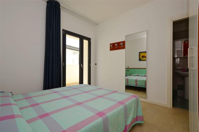 dvoulůžková ložnice a denní místnost - typ APT. 2+2 B4