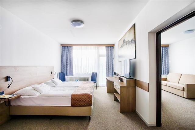 dvoulůžková ložnice a denní místnost - typ APT. 2(+2) B GRAND