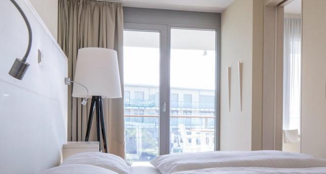dvoulůžková ložnice a denní místnost - apartmány typ APT. 2(+1)
