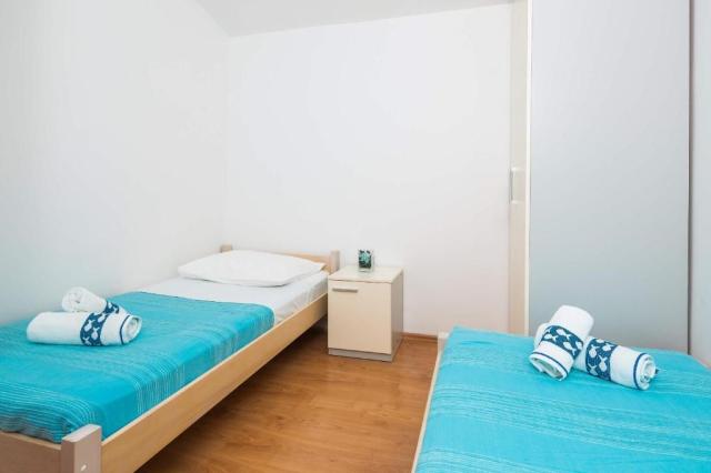 dvě dvoulůžkové ložnice a denní místnost - typ APT. 4(+1)