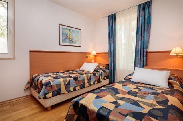 dvě dvoulůžkové ložnice a denní místnost - typ APT. 4+2 DELUXE