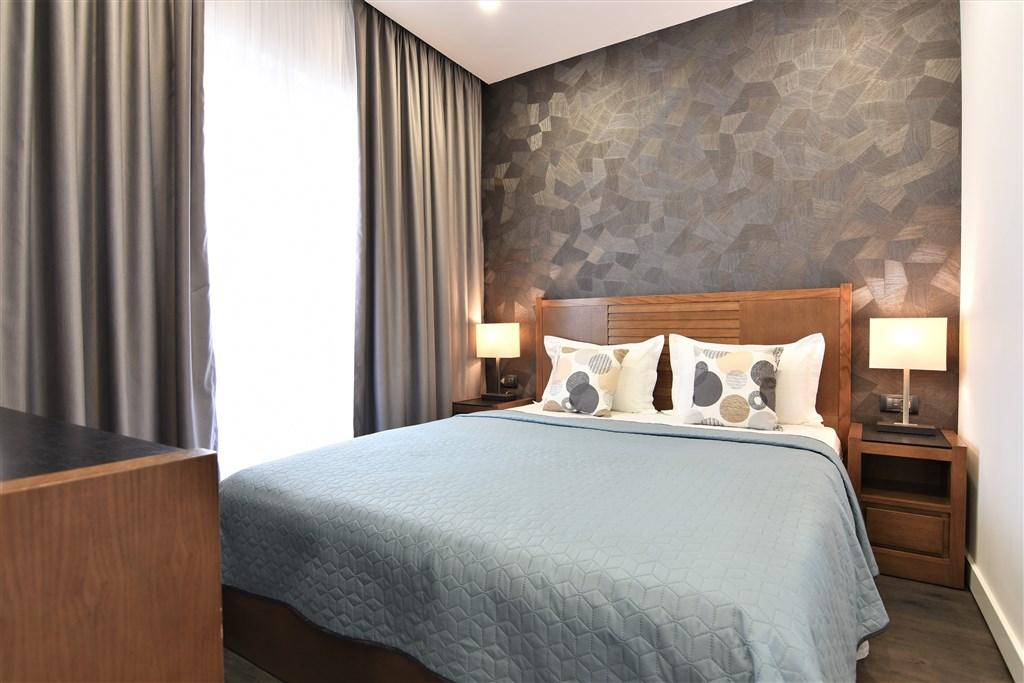 dvoulůžková ložnice a denní místnost - typ Apt. 2+2