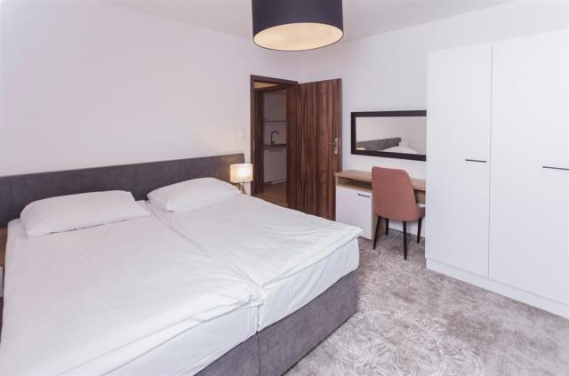 dvoulůžková ložnice a denní místnost - typ APT. 2+2 B SUPERIOR 