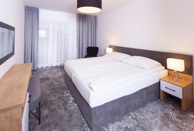 dvoulůžková ložnice a denní místnost - typ APT. 2+1 B SUPERIOR 