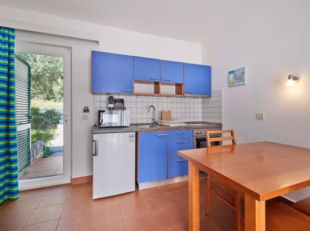 dvoulůžková ložnice a denní místnost (1 přistýlka) - typ APT. A