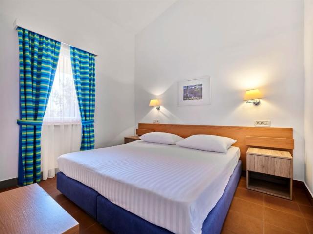 dvoulůžková ložnice a denní místnost - typ APT. B2+2 B
