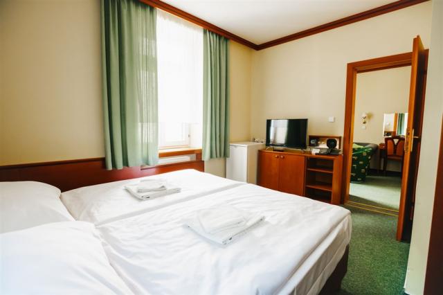 dvoulůžková ložnice a denní místnost - typ Apartmán 2(+2) Comfo