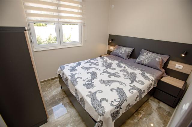 dvoulůžková ložnice a denní místnost - typ APT. 2+2 - č. 101