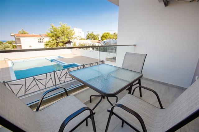 dvoulůžková ložnice a denní místnost - typ APT. 2+2 - č. 104