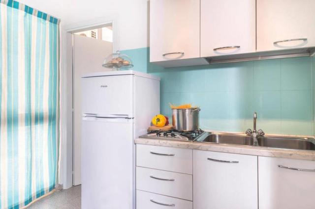 APARTMENT-MINI-CON-PIANO-COTTURA-E-FRIGO-VILLAGGIO.JPG