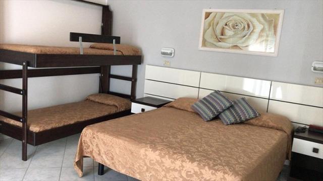 DBL ROOM WITH 2 EXTRA BEDS.JPG