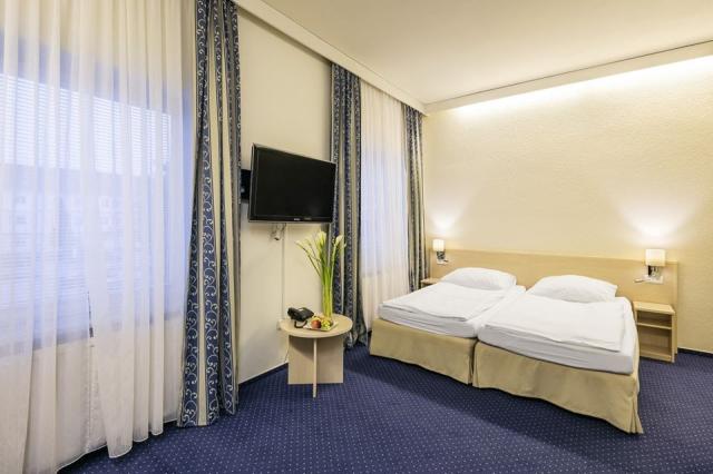 wellness-hotel-amande-hustopece-pokoj-standard.jpg