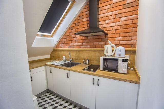 apartmnovy-dum-berill-madarsko-sarvar-apartman-kuchyn.jpg