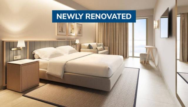 Bluesun hotel Marina - manželská postel, gauč, konferenční stol