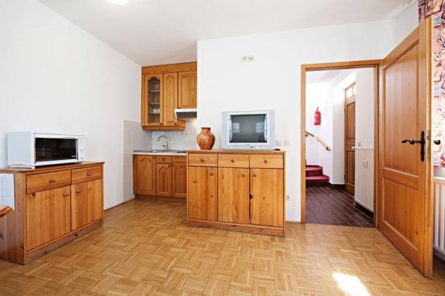 Apartmán přízemí kuchyňský kout.