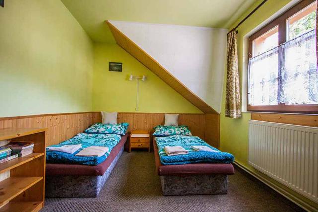 Apartmán ložnice 2 lůžka oddělená.