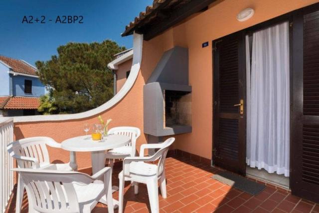 Apartments Savudrija Plava Laguna - apartmá A2+2 terasa se stol