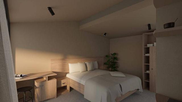 Holiday homes Kačjak - manželská postel, konferenční stolek.