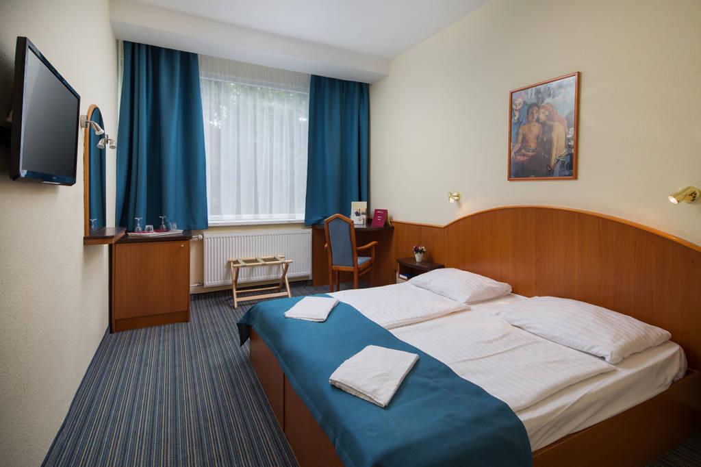 Pokoj Economy 2-lůžkový manželská postel.
