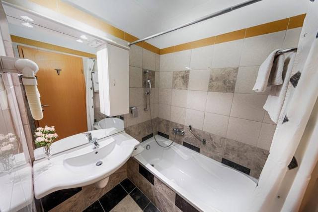 Pokoj hygienické zařízení s vanou.