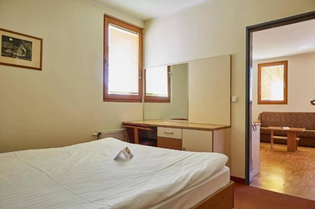 Apartmán ložnice a obývací část.