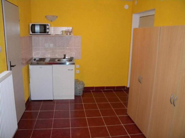 Apartmán kuchyňský kout.