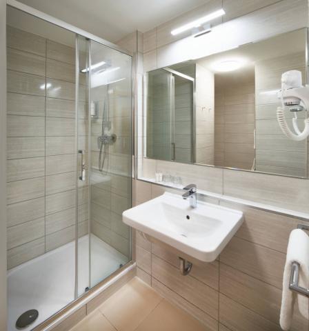 Pokoj De Luxe plus dvoulůžkový pokoj s balkonem