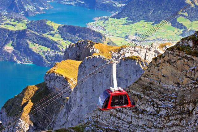 Mount Pilatus aerial cabelway above cliffs and Lake Lucerne shu