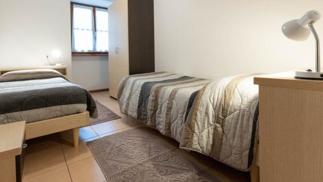 camera-doppia-appartamento-mughetto-residence-cime-doro-1920x10