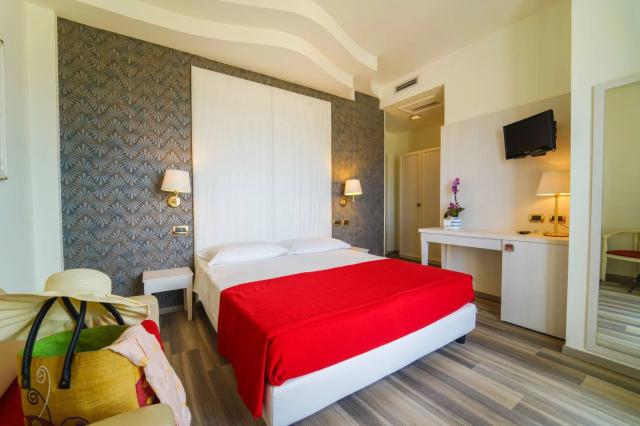 1639407971_fotogallery-06-hotel-rimini-camere-confortevoli-vist