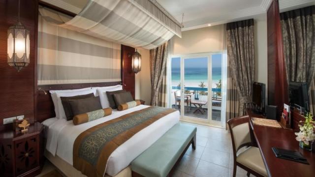 12-Deluxe-Suite-Bedroom.jpg