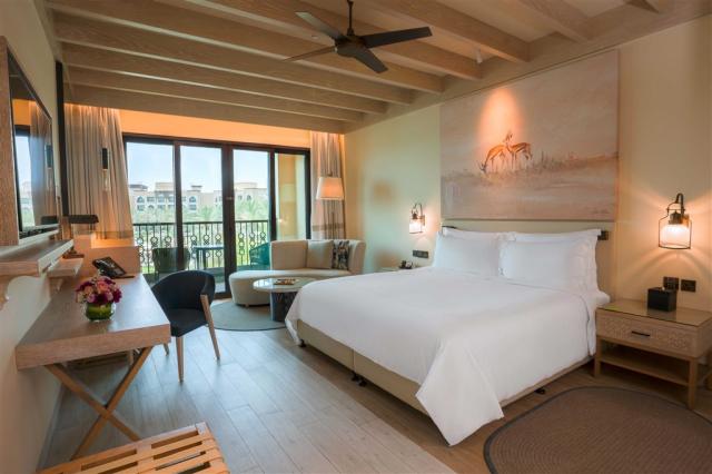 1 - Guest Room with Balcony - King.jpg