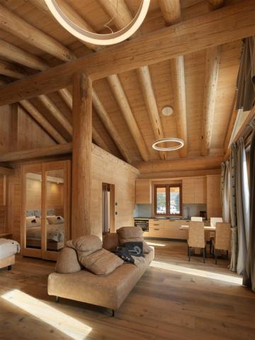 luxury-chalets-dolomites-salotto-scaled.jpg