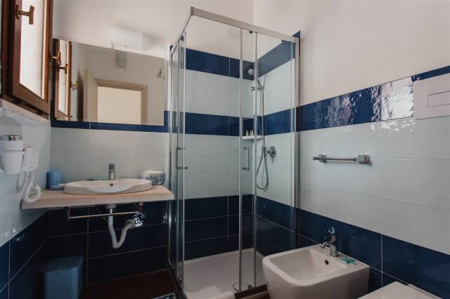 fior-di-sardegna-resort-camera-classic-bagno-1-1.jpg
